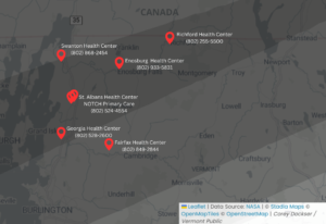 Map of the northwestern region of Vermont and the total solar eclipse path of totality, showing NOTCH health care center locations and contact information.